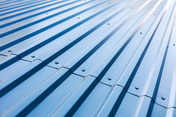 blue-corrugated-metal-roof-with-rivets